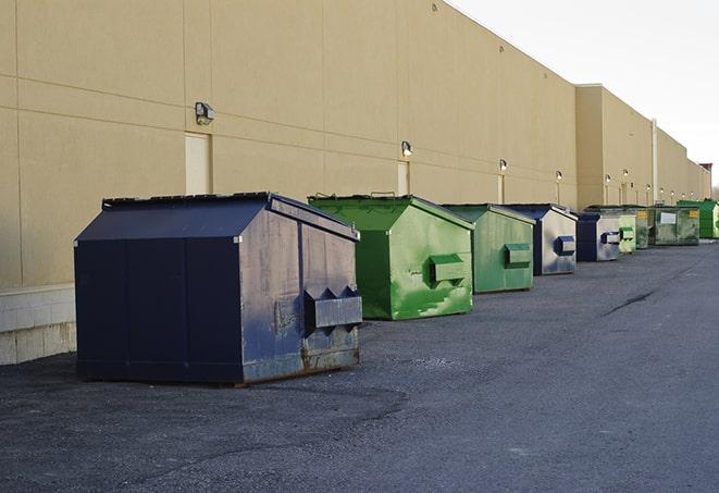 heavy-duty roll-off dumpsters outside a construction zone in Black Diamond